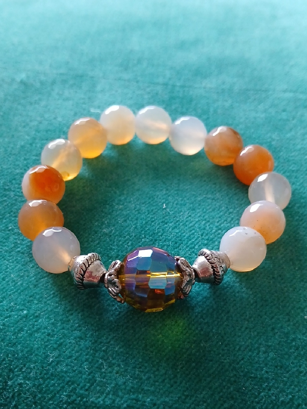 Faceted Orange Agate & White Bead Stretch Bracelet With Irridescent Center Stone